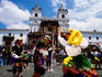 Dancers in traditional dress outside San Francisco Church, Old Quarter.