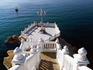 Staircase and balcony leading to sea.