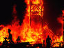 Hoguera monument burning at Hogueras de San Juan festival.