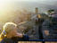 Woman looking over rooftops, Umbria