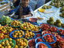 Young boy selling fruit and vegetables at Municipal Market