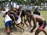 Redrock team training for rugby at Albert Park across from Grand Pacific Hotel.