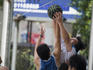 Playing basket ball beside Shanghai Stadium, Hongqiao.