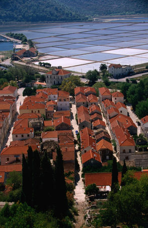 Overhead of town and ancient salt pans.