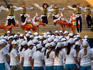 Leaping and twirling dancers at Sochi city festival.