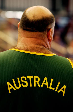 Back of man at woodchop competition, Royal Melbourne Show.