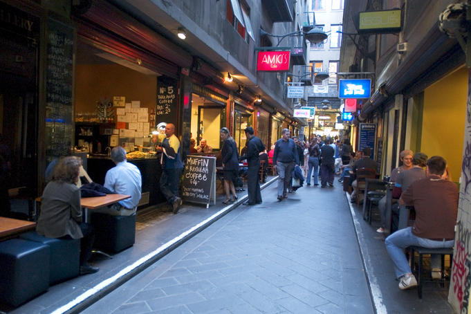 People sitting outside cafes in Center Place, city centre.