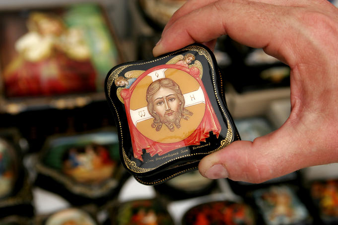 Close-up of hand-painted wooden jewellery box.