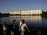 People near waterfront of Palace of Sports.