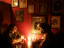 Friends drinking beer by candlelight in Alchemia Bar, old Jewish Quarter.