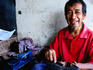 Portrait of shoe repairer in downtown.