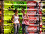 Young girls infront of billboard.