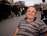 Laughing stall holder at market, Yerevan
