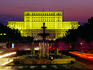 Palace of Parliament and fountains in Unirri Square at dusk.