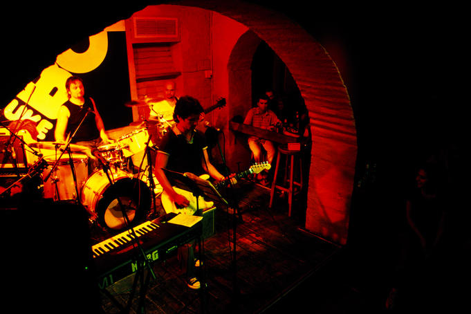 Overhead of band playing at Juke Box Bar.
