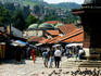 Main square of Turkish section of Bascarsija with rooftops of Brusa Bezistan-Bazar in background, Sebilji fountain in foreground.