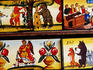 Paintings on wood blocks for sale at Central Market.