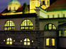 Plecnik Colonnade and Cathedral of St Nicholas at dusk.