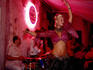 Belly dancer performing with jazz band at Troubadour Cafe.