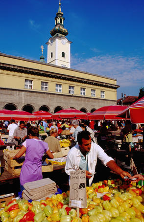 Traders and stalls at city market.
