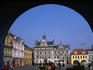 Renaissance and Baroque houses on Karlovo Square through arch of Baroque house in town of Kolin.