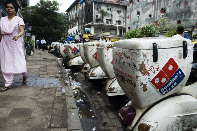 Pizza delivery scooters.