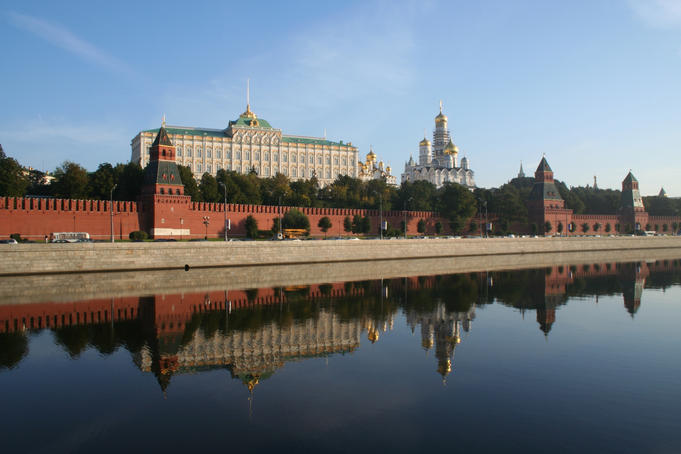 Great Kremlin Palace reflected in Moskva River.