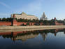 Great Kremlin Palace reflected in Moskva River.
