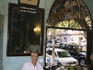 Boman Rashid Kohinoor at checkout counter in restaurant his father founded in 1923.