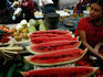 A Mayan girl working at a fruit stall.