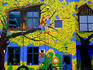 Brightly painted exterior of school on Commercial Drive.