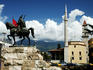 Statue of 15th century Albanian military genius Skanderberg stands over square named after him.