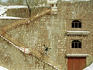 Snowboarder going down handrail, on stairs, Shemshak, Alborz Mountains.