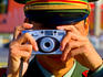 Guard using his camera on China's National Day in Tianamen Square,