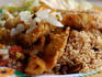 Rice with beans (National Dish in Belize) with fried fish fillets, salsa salad.