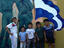 Children in front of mural.