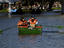 Family boating on artificial lake in Bosques de Palermo (Palermo's Park).