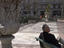 Man relaxing in Plaza Cagancha Square.