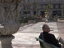 Man relaxing in Plaza Cagancha Square.