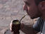 Man drinking mate in  General San Martin park.