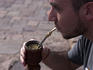 Man drinking mate in General San Martin park.