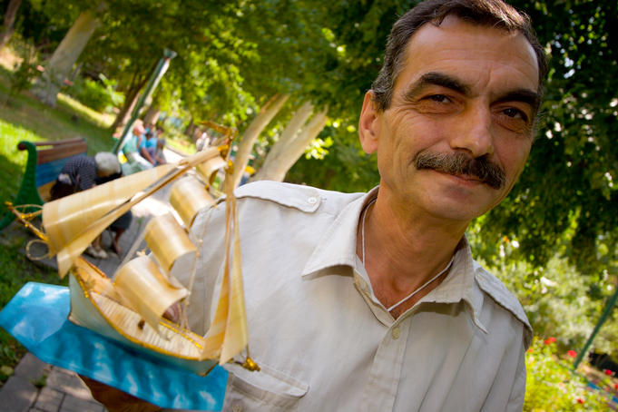 Portrait of mini ship builder, Yerevan