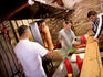 People waiting to be served kebabs.
