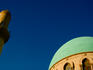 Minaret and dome of mosque.