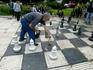 Men playing chess on giant board, Turkish Quarter.