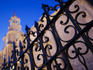 Iron railing and cathedral.
