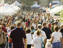 Crowded aisle at the weekend Market and Festival.