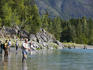 Fishermen lining Bird Creek during salmon run.