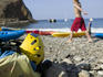 Sea kayaking gear on beach at Scorpion Anchorage.