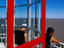 Men on viewing platform on top of lighthouse.